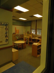 looking-into-a-toddler-classroom-from-the-observation-booth-at-the-child-development-labs